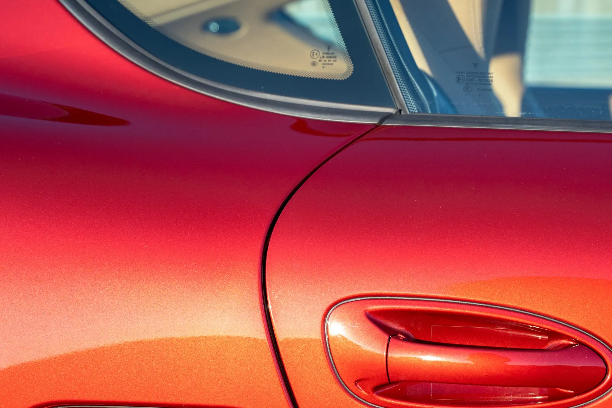 2009 Porsche Cayman in Ruby Red Metallic