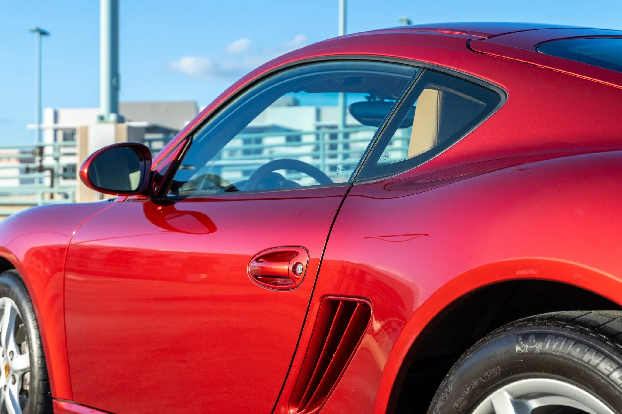 2009 Porsche Cayman in Ruby Red Metallic