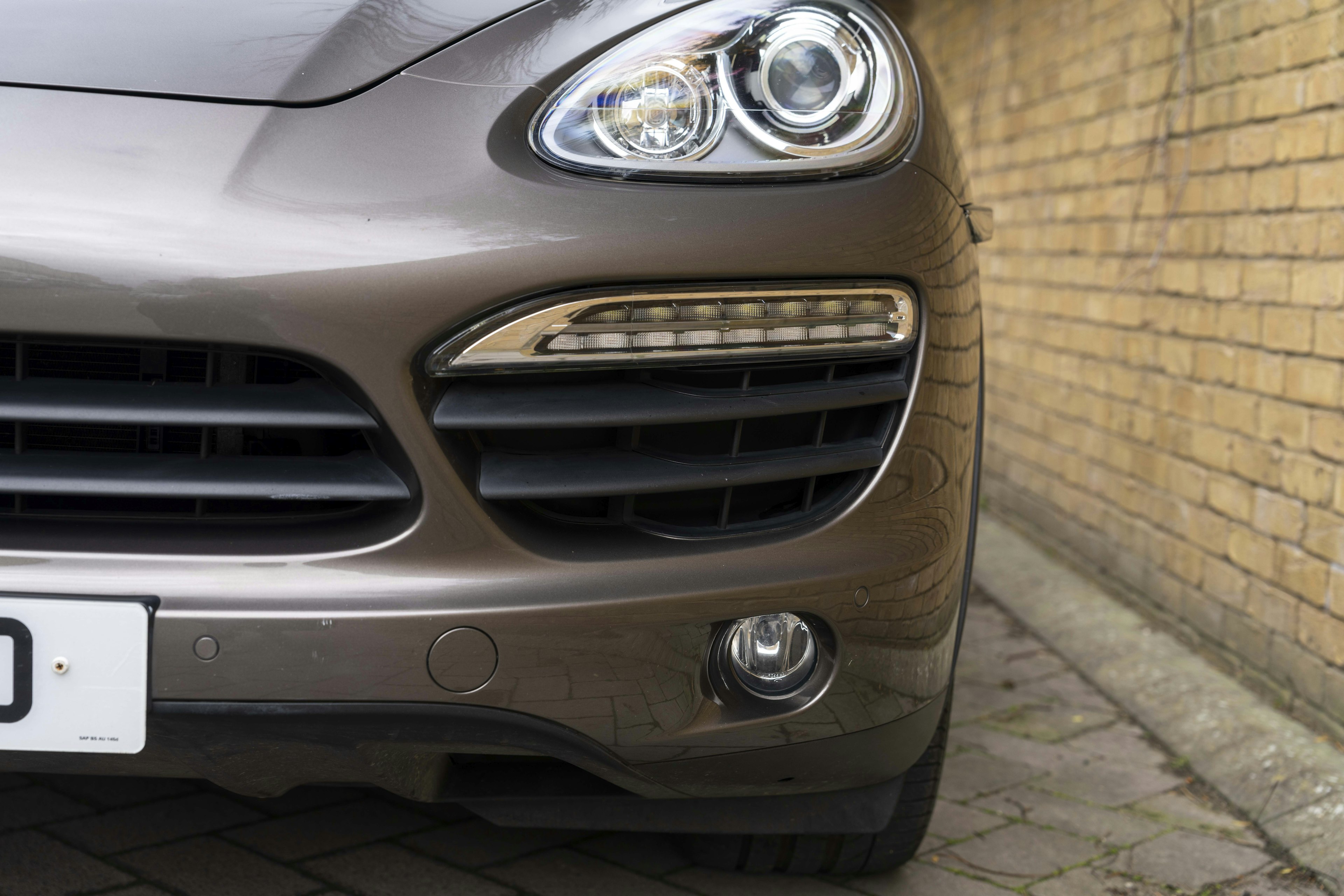 2010 PORSCHE CAYENNE S HYBRID in Umbra Metallic 