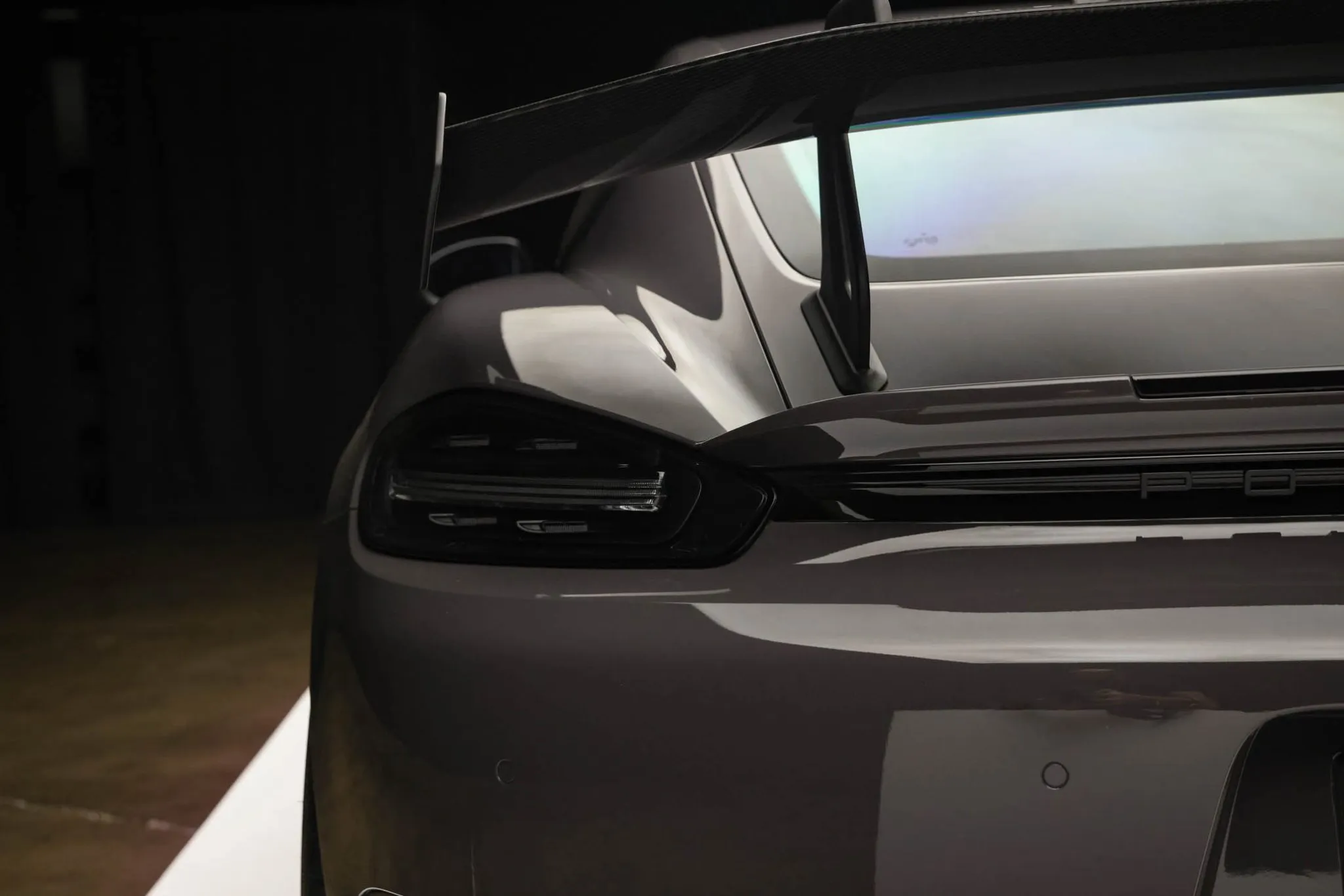 2023 Porsche 718 Cayman GT4 RS Weissach in Grey Black