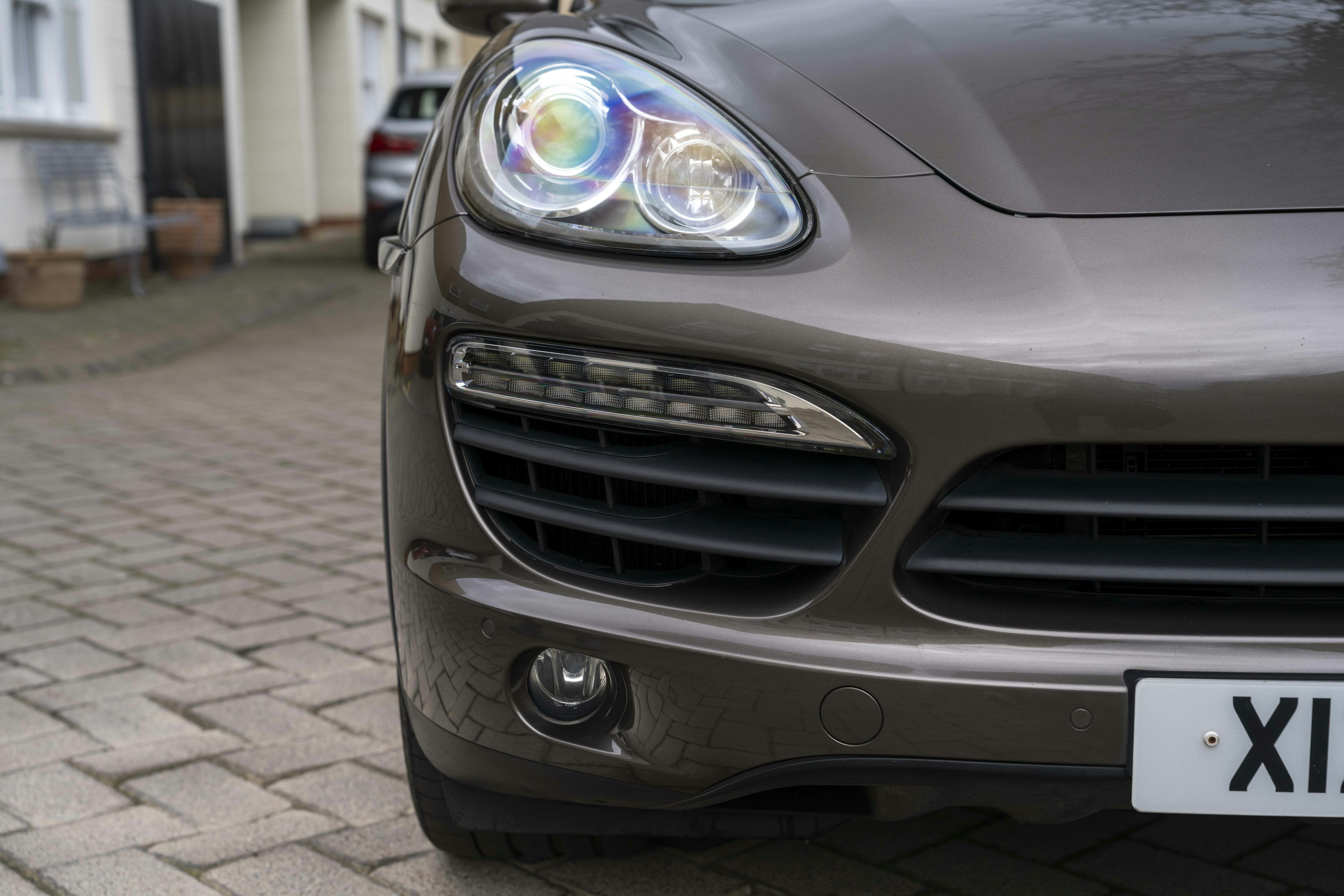 2010 PORSCHE CAYENNE S HYBRID in Umbra Metallic 
