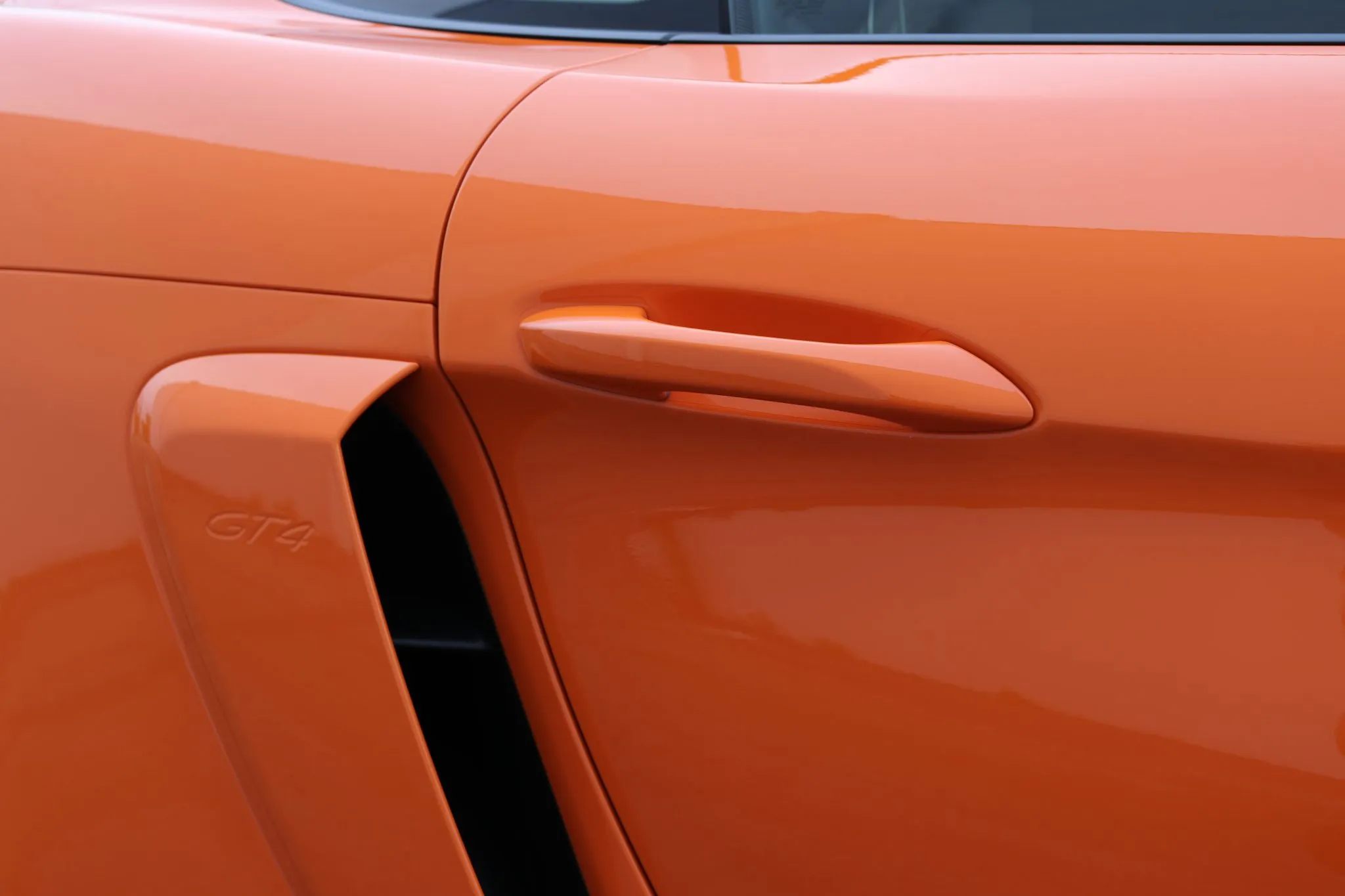 2021 Porsche 718 Cayman GT4 in Pastel Orange