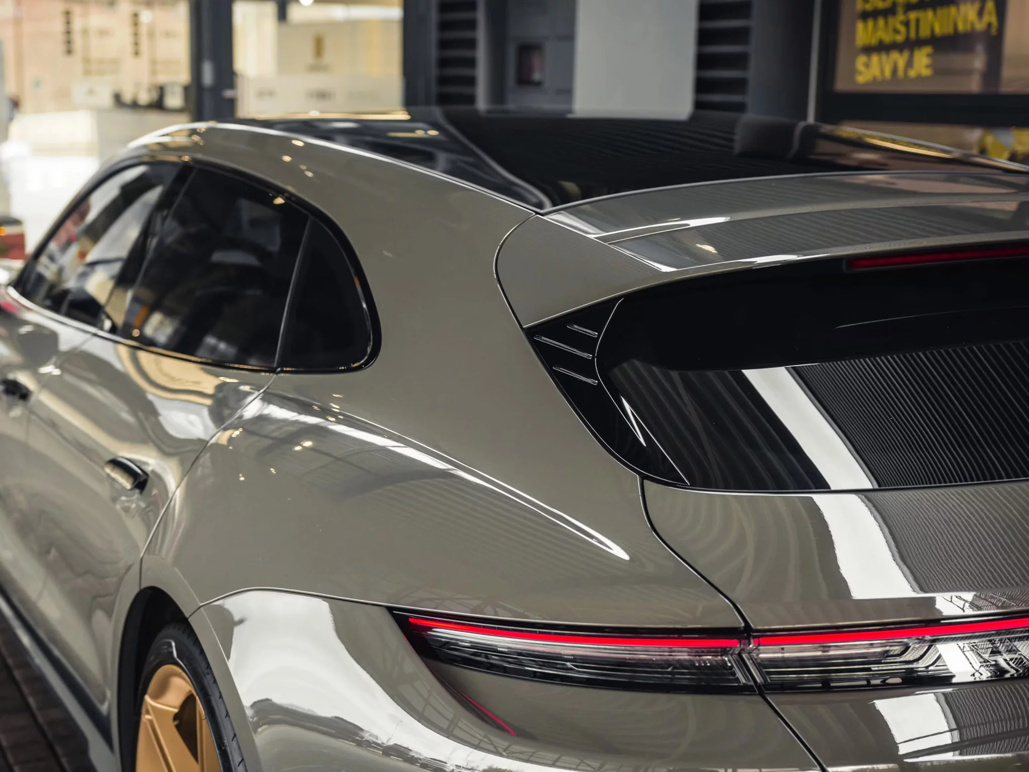 Porsche Taycan Sport Turismo in Alex Grey